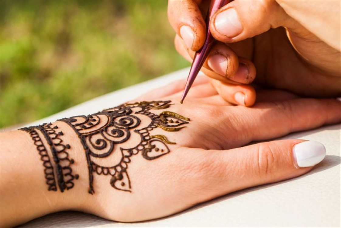 Wat is de interpretatie van henna in een droom?