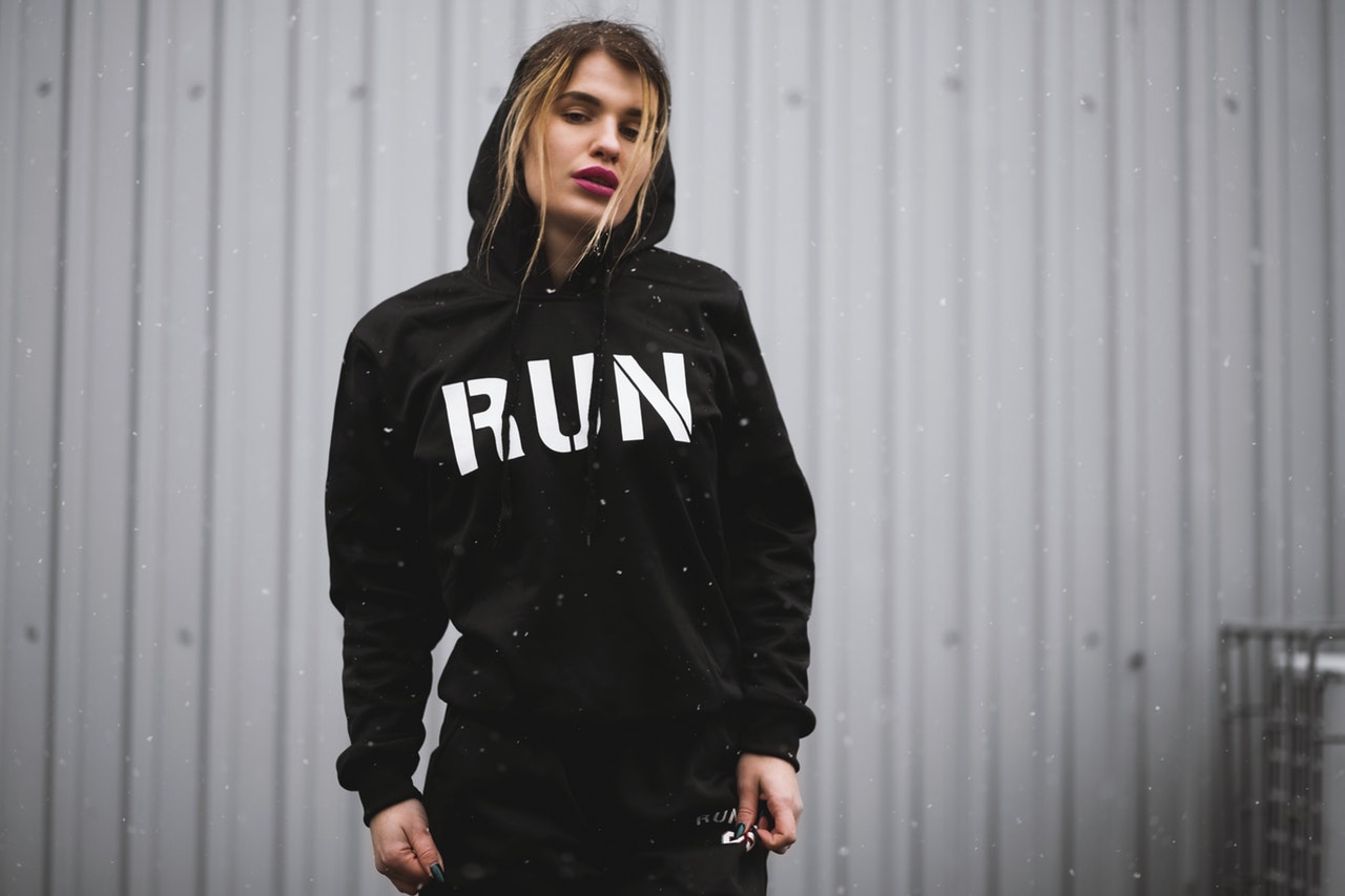 woman wearing black and white run printed pullover hoodie 1040424 - موقع مصري